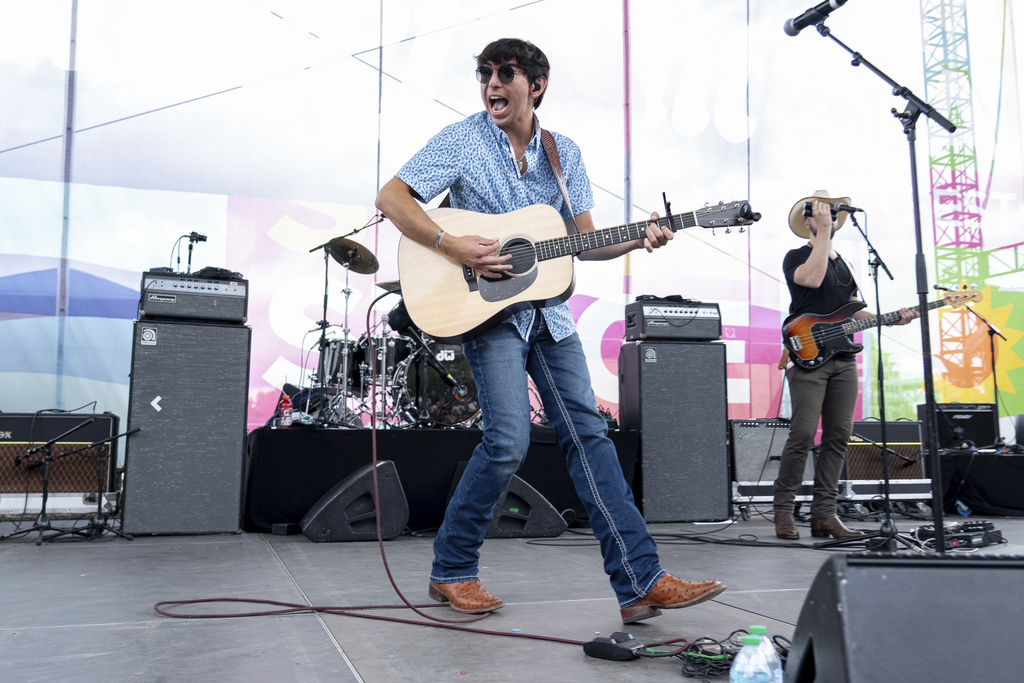 Wyatt Flores performing at CMA Fest on June 9, 2024, in Nashville, Tenn. (Photo by Amy Harris/Invision/AP)