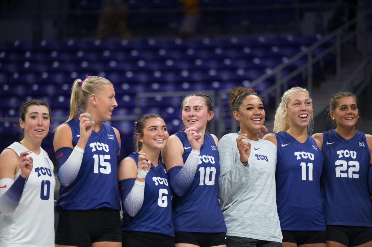 TCU volleyball team cheers after winning the match. The TCU Horned Frogs beat the Wyoming Cowgirls 3-0 at Schollmaier Arena in Fort Worth, Texas, Sep. 11, 2025. (TCU360/Keegan Schmidt)