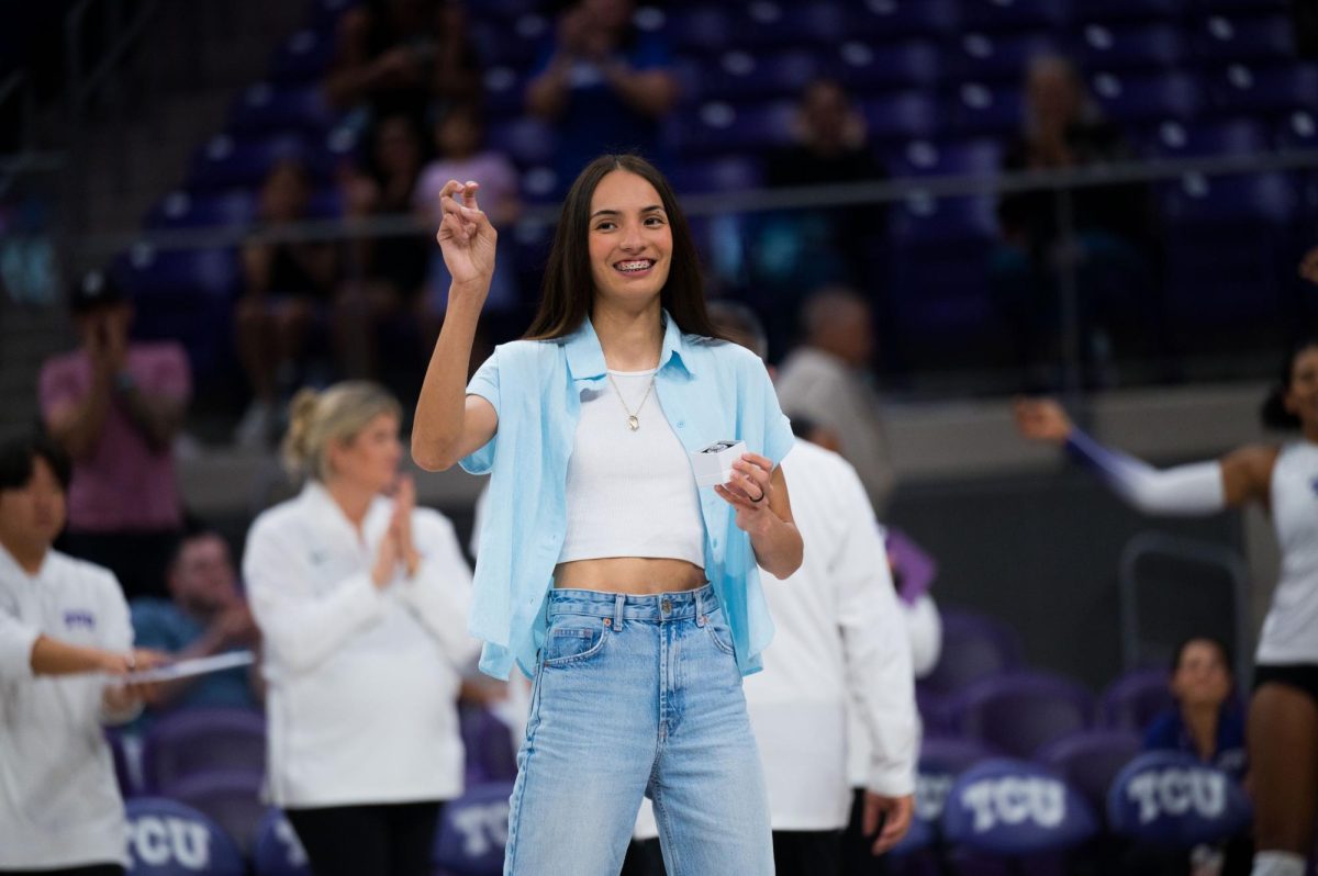 Former TCU volleyball player Melanie Parra greets the crowd at Schollmaier Arena in Fort Worth, Texas, Sep. 24, 2025. The TCU Horned Frogs beat the Houston Cougars 3-0. (TCU360/Keegan Schmidt)