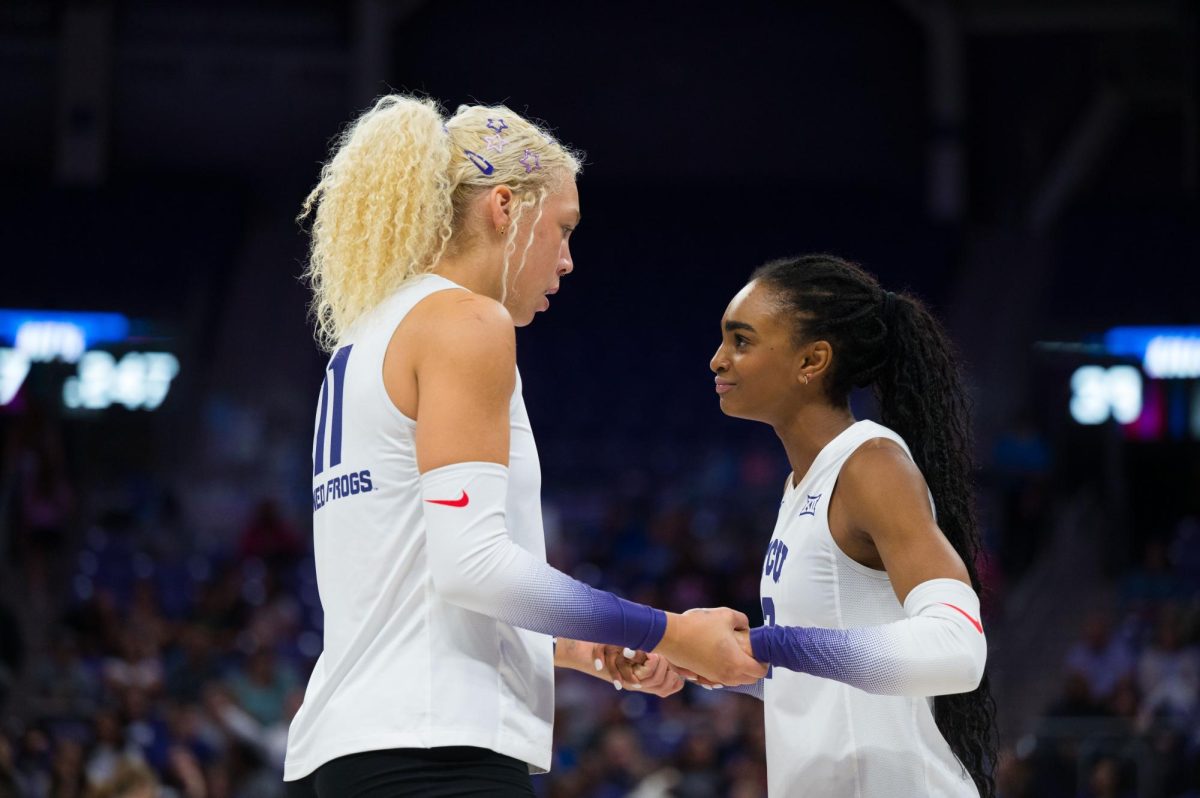 TCU outside hitter Becca Kelley encourages other outside hitter Evan Hendrix at Schollmaier Arena in Fort Worth, Texas, Sep. 24, 2025. The TCU Horned Frogs beat the Houston Cougars 3-0. (TCU360/Keegan Schmidt)