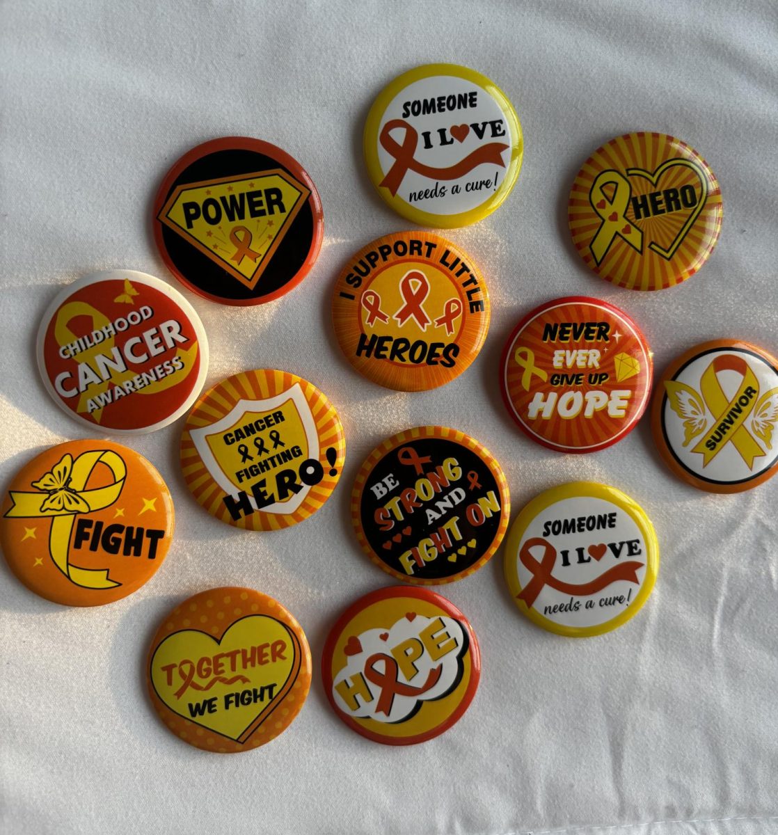 Pins that will be given away at the race on Saturday, Sept. 28.