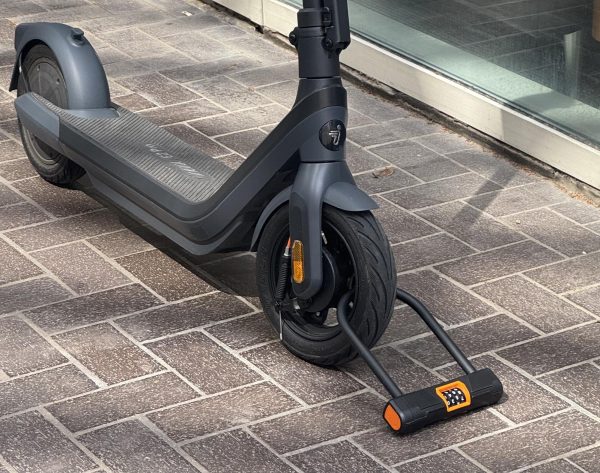 A scooter parked outside of Moudy North with a wheel lock. According to the TCU Police crime log, 17 scooters have been reported stolen since Aug. 15, 2025. (Fabian Alvidrez/Staff Writer)