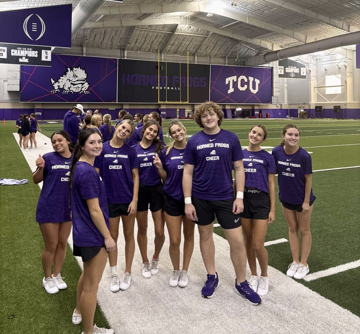 TCU cheer after practice.