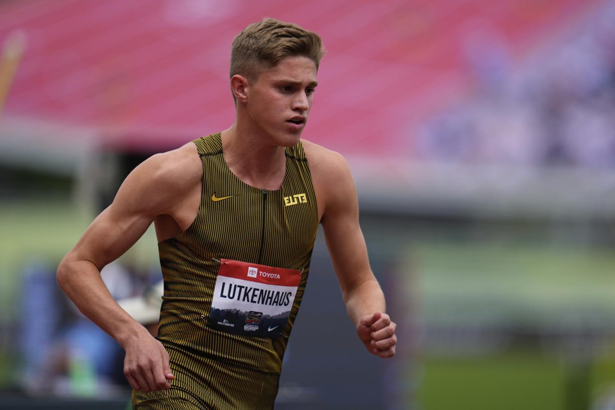 Cooper Lutkenhaus, a junior at Northwest High School, sets a world under-18 record at the USA Track and Field Finals. (AP Photo/Abbie Parr)