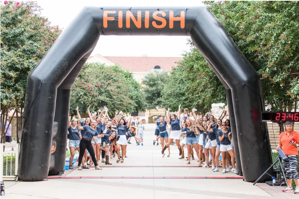 Members of TCU Kappa Alpha Theta cheer on runners during the 2022 Theta CASA 5k (Rob Greene, Square 8 Studio) 