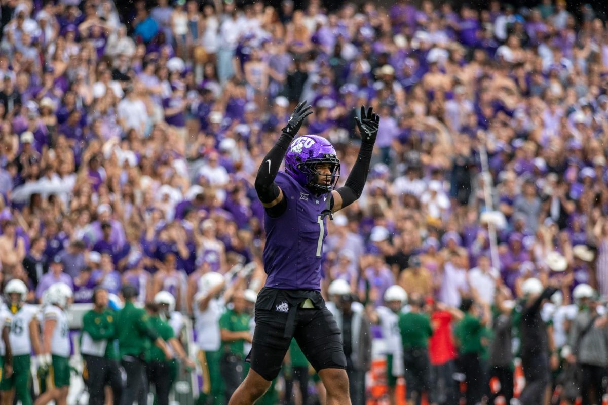 TCU safety Austin Jordan pumps up the crowd at Amon G. Carter Stadium in Fort Worth, Texas Oct 18, 2025. The TCU Horned Frogs defeated the Baylor Bears 42-36 (TCU360/Logan Pope).