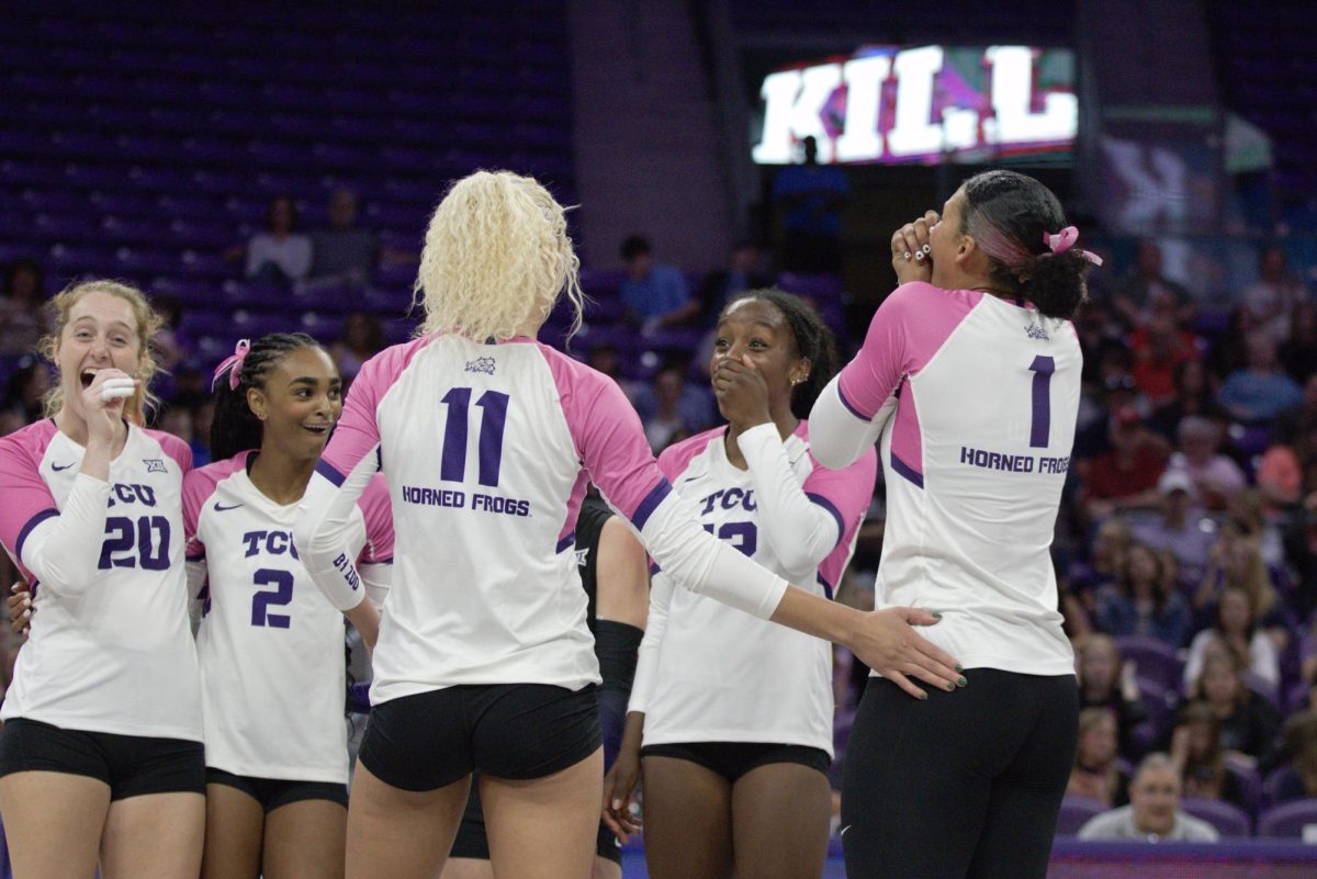 TCU setter Ella Foti (left), outside hitter Evan Hendrix (center-left), outside hitter Samara Coleman (center-right), and middle blocker Alexis Roberson (right), are left stunned after opposite hitter Becca Kelley (center) spikes the ball at Schollmaier Arena in Fort Worth, Texas Oct. 15, 2025. The TCU Horned Frogs beat the Cincinnati Bearcats 3-1 (TCU360/Logan Pope).