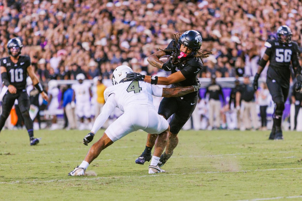 TCU wide receiver Jordan Dwyer breaks a tackle at Amon G. Carter Stadium in Fort Worth, Texas, Oct. 4, 2025. (TCU360/Tyler Chan)