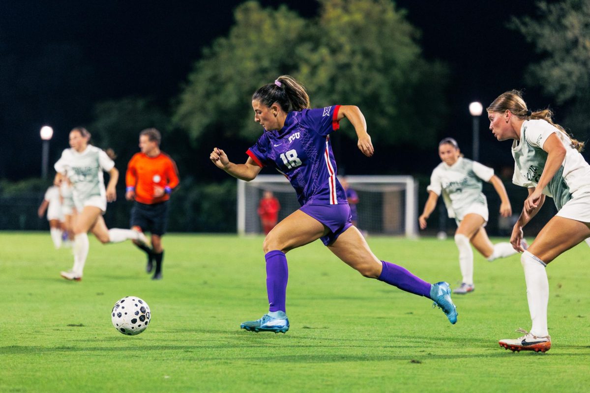 TCU midfielder Emma Yolinsky dribbles the ball past the defender at Garvey Rosenthal Stadium in Fort Worth, Texas, Oct. 16, 2025. The TCU Horned Frogs beat the Baylor Bears 3-0. (TCU360/Tyler Chan)