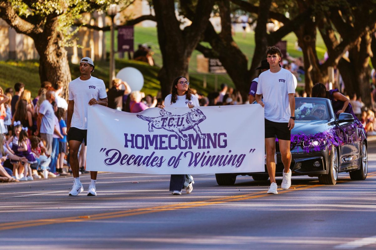 TCU students walk down Stadium Drive to kick off the homecoming parade in Fort Worth, Texas Oct. 17, 2025. (TCU360/ Tyler Chan)