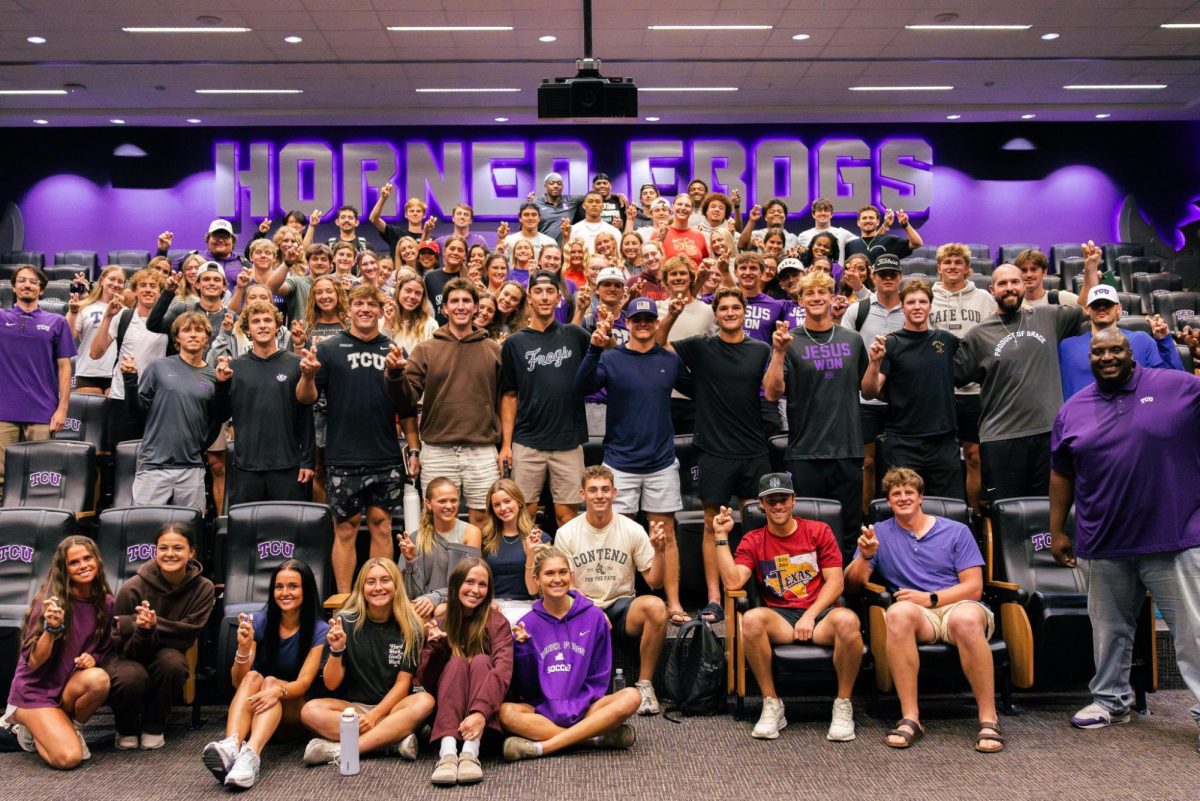 FCA staff and students gather for a group photo following their final huddle in the sermon series “The Gospel” on Sept. 29, 2025. (AJ Bickham)