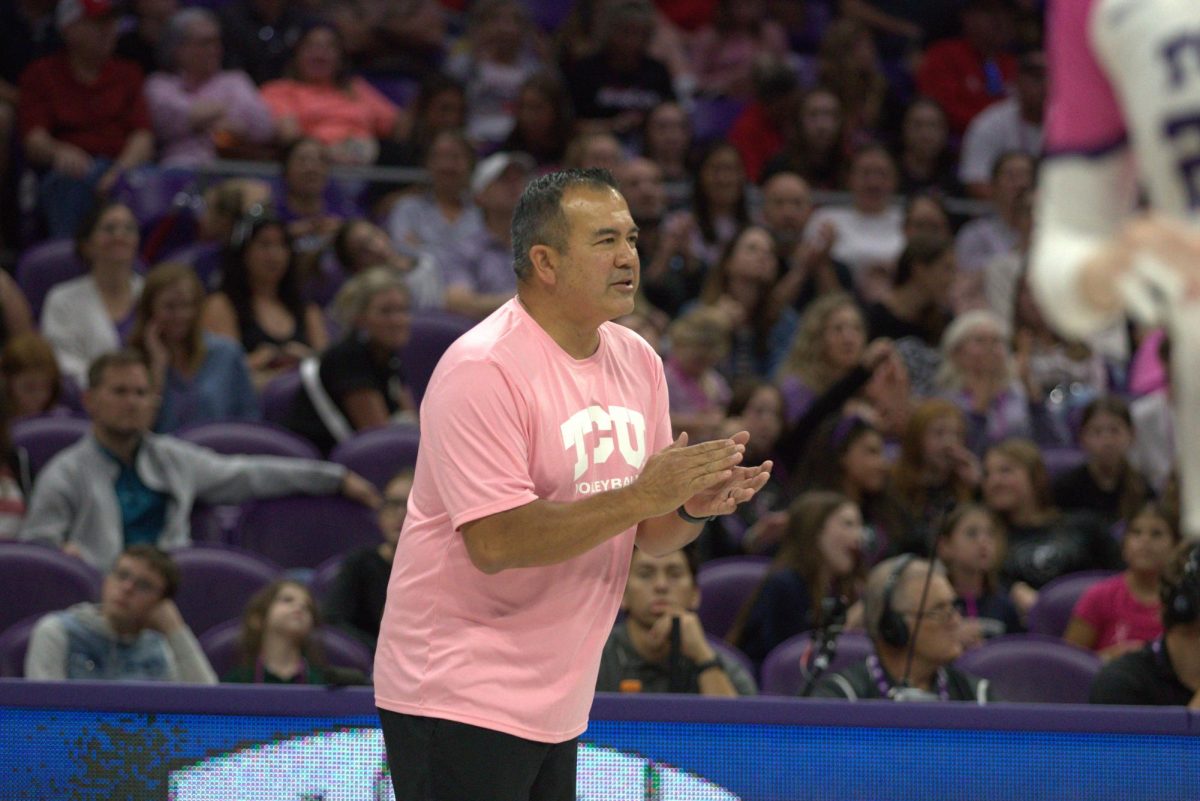 TCU head coach Jason Williams cheers on his team at Schollmaier Arena in Fort Worth, Texas Oct. 15, 2025. The TCU Horned Frogs beat the Cincinnati Bearcats 3-1 (TCU360/Logan Pope).