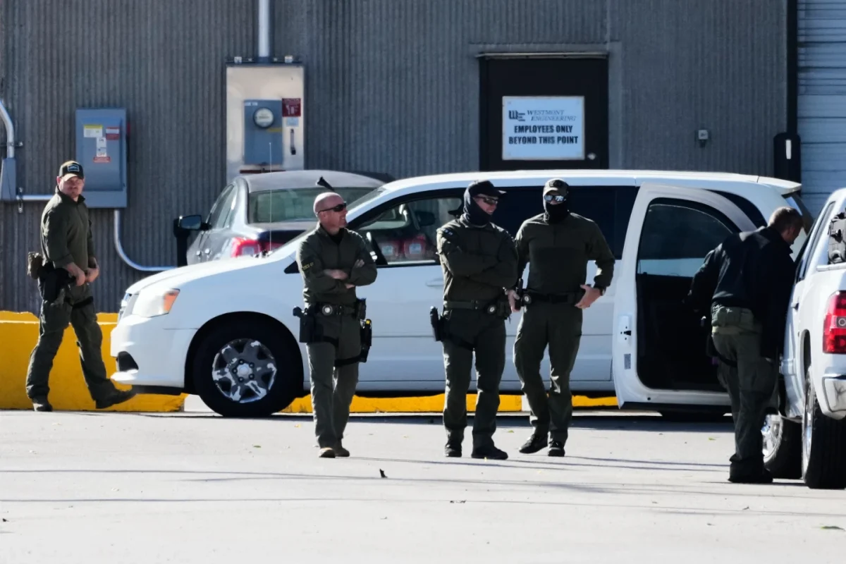Federal Patrol agents stand outside an ICE processing facility in the Chicago suburb of Broadview, Ill., Tuesday, Oct. 21, 2025.