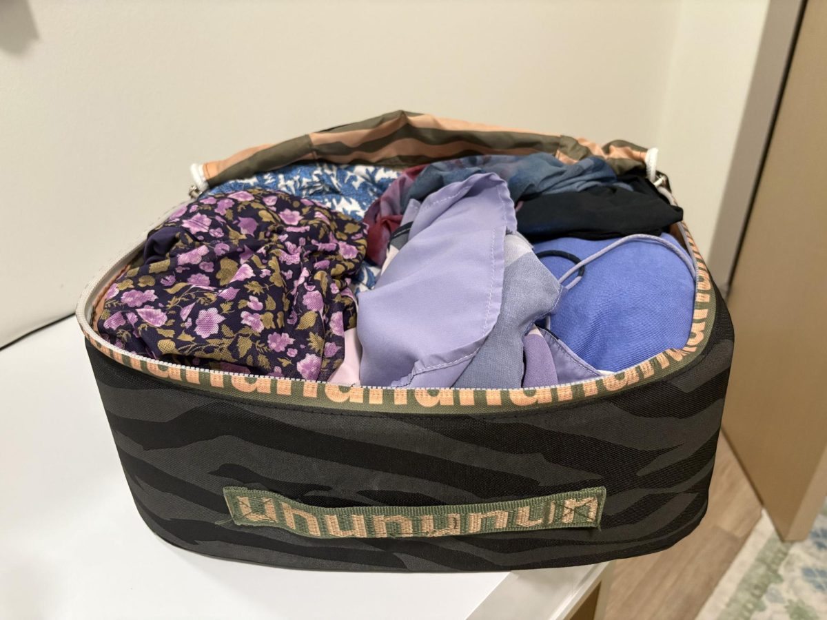 Nuuly subscription items come in their signature black and grey bag with a free return label to easily ship them back at the end of the month. (Anna Gasowski/Staff Writer)