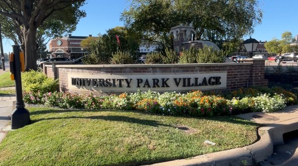 Entrance sign into University Park Village off S. University Drive