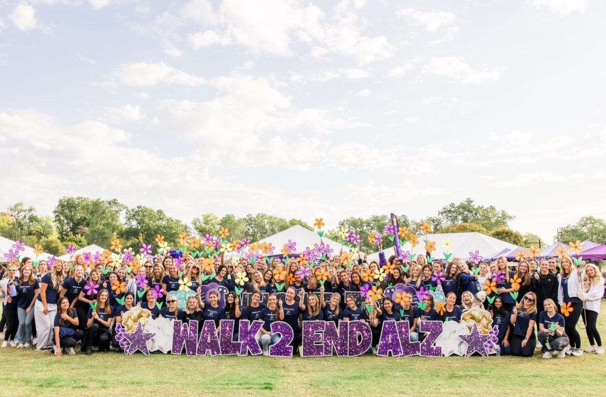 Sigma Kappa posing for a picture at the Fort Worth Walk to End Alzheimer's. (Photo courtesy of TCU Sigma Kappa)