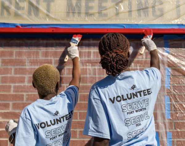 TCU students paint during TCU Day of Service 2024. (Courtesy of Texas Christian University's Instagram)