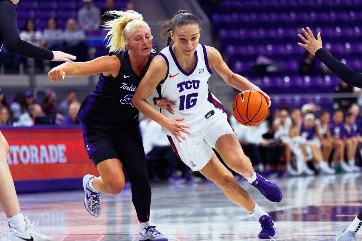 TCU forward Clara Bielefeld dribbles around the defenderat Schollmaier Arena in Fort Worth, Texas, Nov. 20, 2025. The TCU Horned Frogs beat the Tarleton State Texans 80-32. (TCU360/ Tyler Chan)