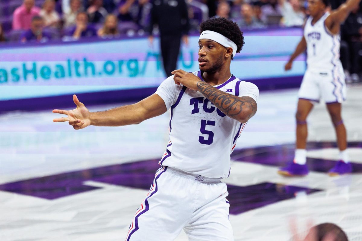 TCU forward Micah Robinson celebrates after making a three pointer at Schollmaier Arena in Fort Worth, Texas, Nov. 14, 2025. The TCU Horned Frogs lost to the Michigan Wolverines 63-67. (TCU360/Tyler Chan)