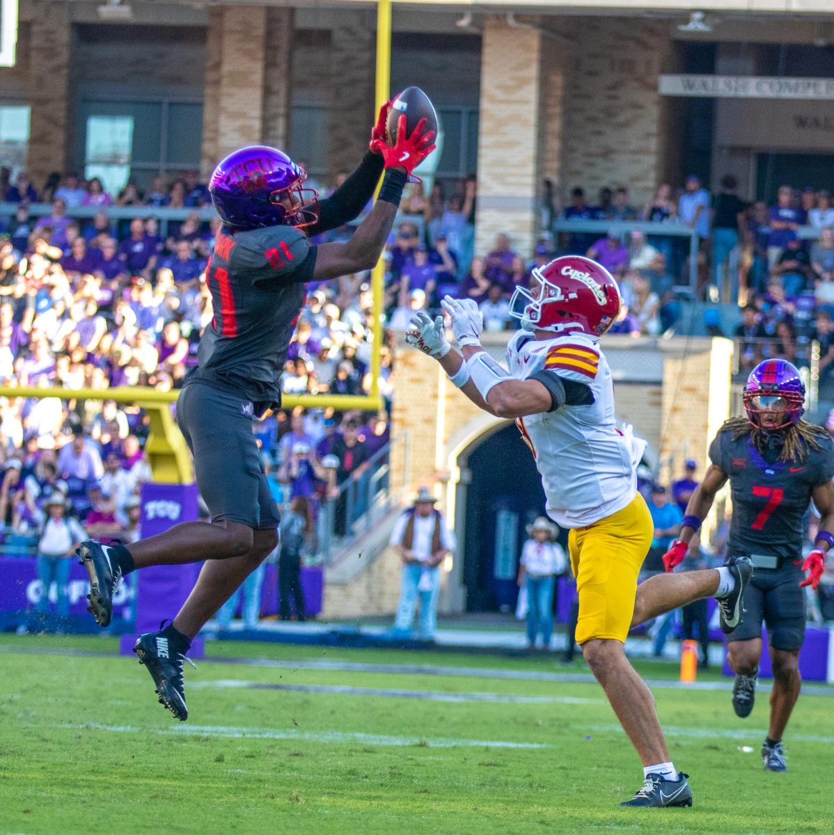 TCU safety Bud Clark intercepts a pass intended for Iowa State receiver Brett Eskildsen (9) at Amon G. Carter Stadium in Fort Worth, Texas Nov. 8, 2025. The Horned Frogs lost to the Iowa State Cyclones 20-17 (Logan Pope/TCU360).