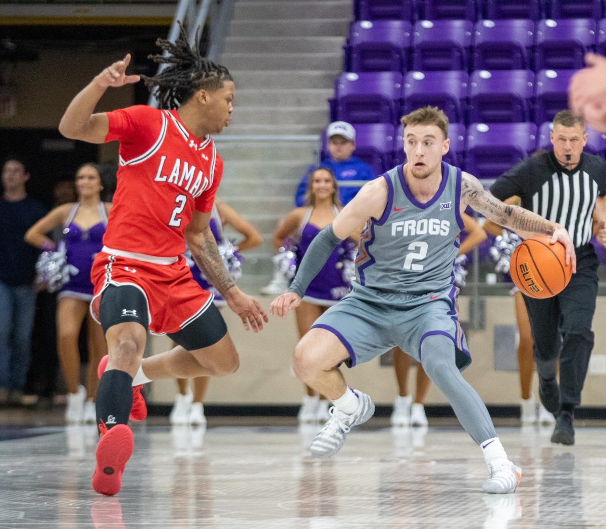 TCU guard Brock Harding dribbles towards Lamar guard Jayden Barrs (2) at Ed and Rae Schollmaier Arena in Fort Worth, Texas Nov. 10, 2025. The Horned Frogs defeated the Lamar Cardinals 78-65 (TCU360/Logan Pope).