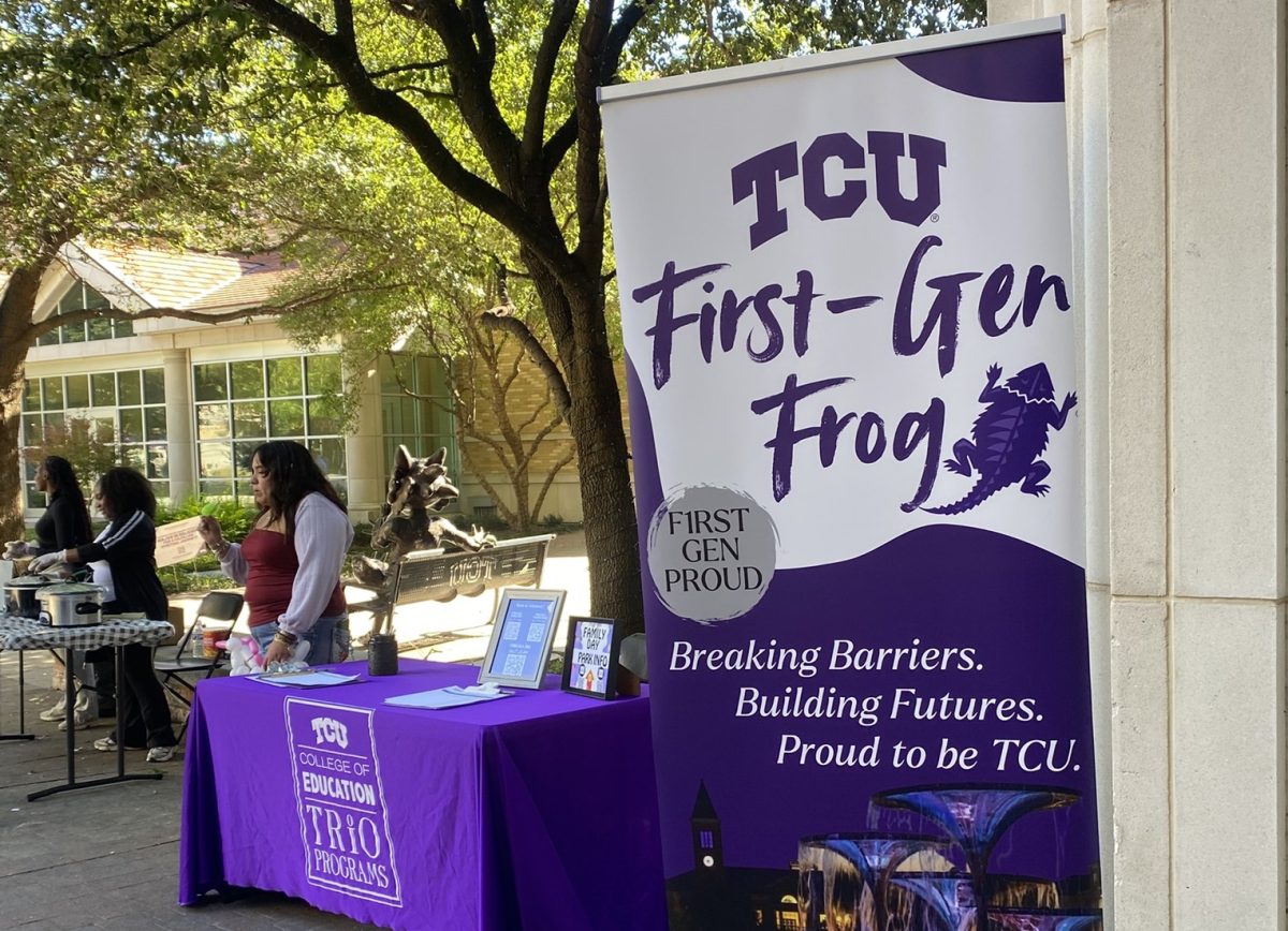 A welcome table for First-Gen Family Day stands outside the Brown-Lupton University Union on Nov. 2 as part of TCU’s First-Gen Week events. (Miroslava Lem Quinonez/Staff Writer)