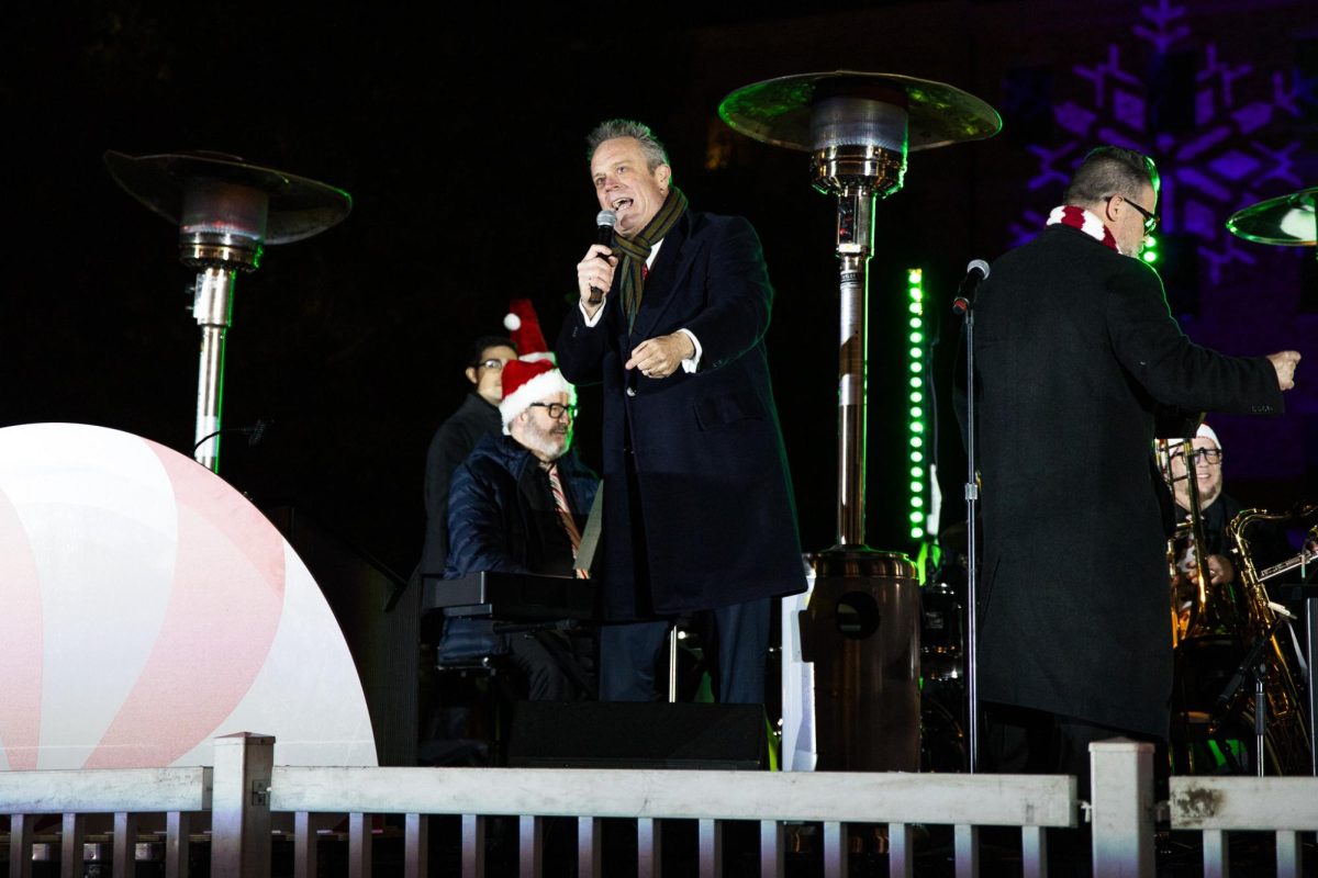 Ricki Derek and his holiday orchestra perform christmas songs during the TCU Tree Lighting celebration in Fort Worth, Texas, Dec. 2, 2025. (TCU360/Tyler Chan)