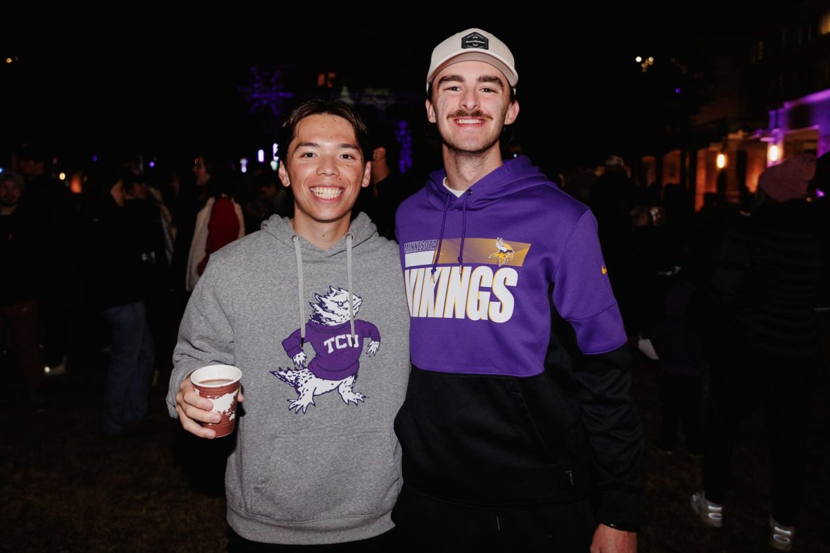 Two students pose for a picture before the TCU Tree Lighting celebration in Fort Worth, Texas, Dec. 2, 2025. (TCU360/Tyler Chan)