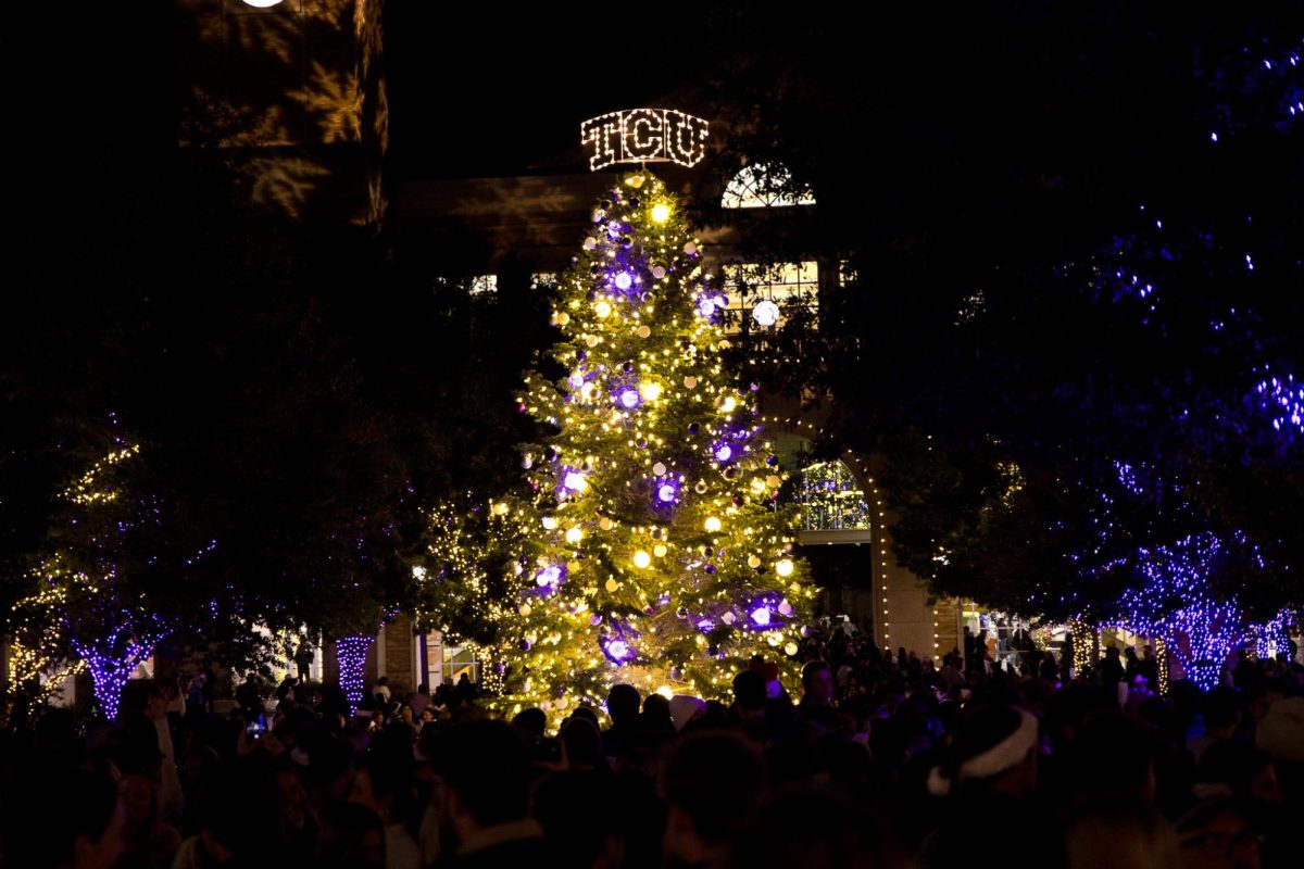 People gather around the christmas tree during the TCU Tree Lighting celebration in Fort Worth, Texas, Dec. 2, 2025. (TCU360/Tyler Chan)