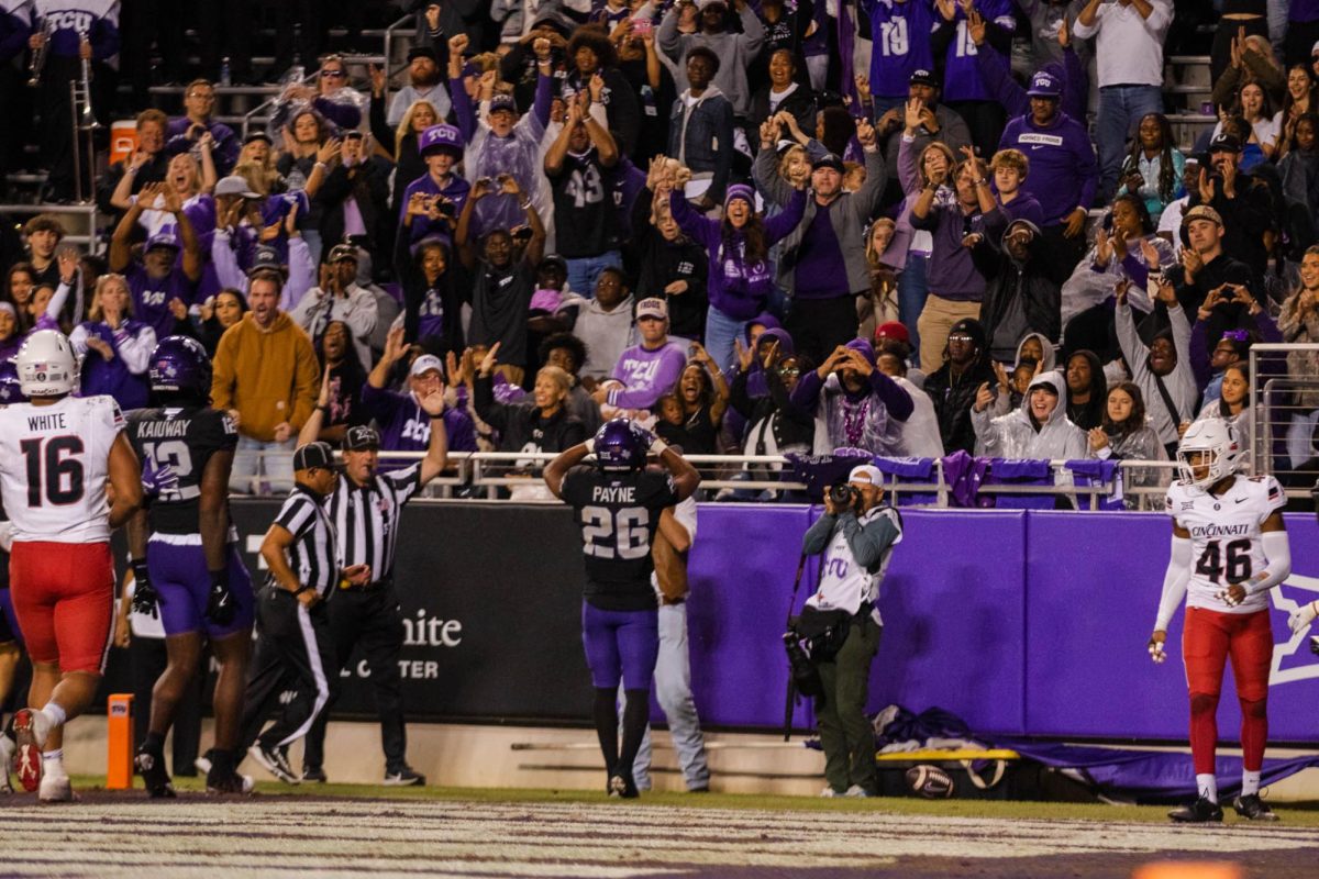 TCU Running Back Jeremy Payne celebrates with fans after scoring a touchdown at Amon G. Carter Stadium in Fort Worth, Texas, on Nov. 29, 2025. The TCU Horned Frogs defeated the Cincinnati Bearcats 45–23. (TCU360/Nghia Tran)