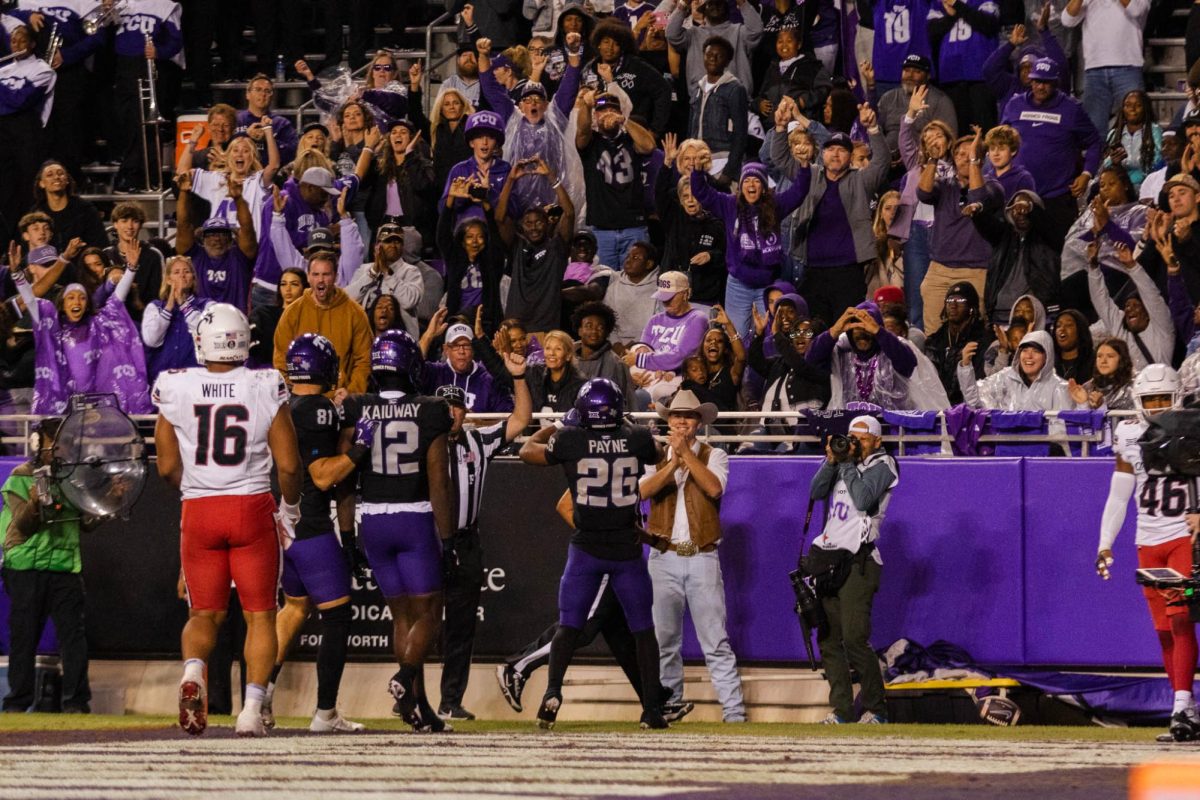 TCU Running Back Jeremy Payne celebrates with fans after scoring a touchdown at Amon G. Carter Stadium in Fort Worth, Texas, on Nov. 29, 2025. The TCU Horned Frogs defeated the Cincinnati Bearcats 45–23. (TCU360/Nghia Tran)