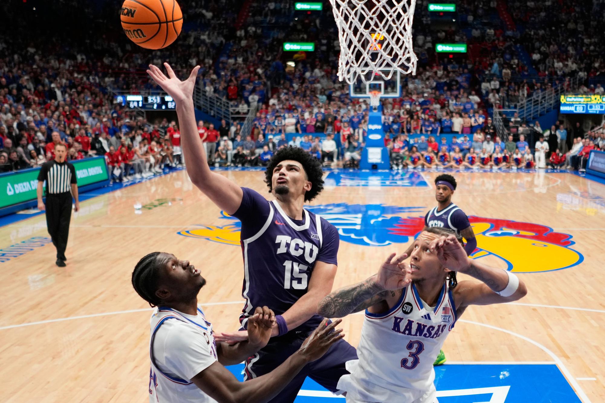 TCU men's basketball falls apart late in Lawrence