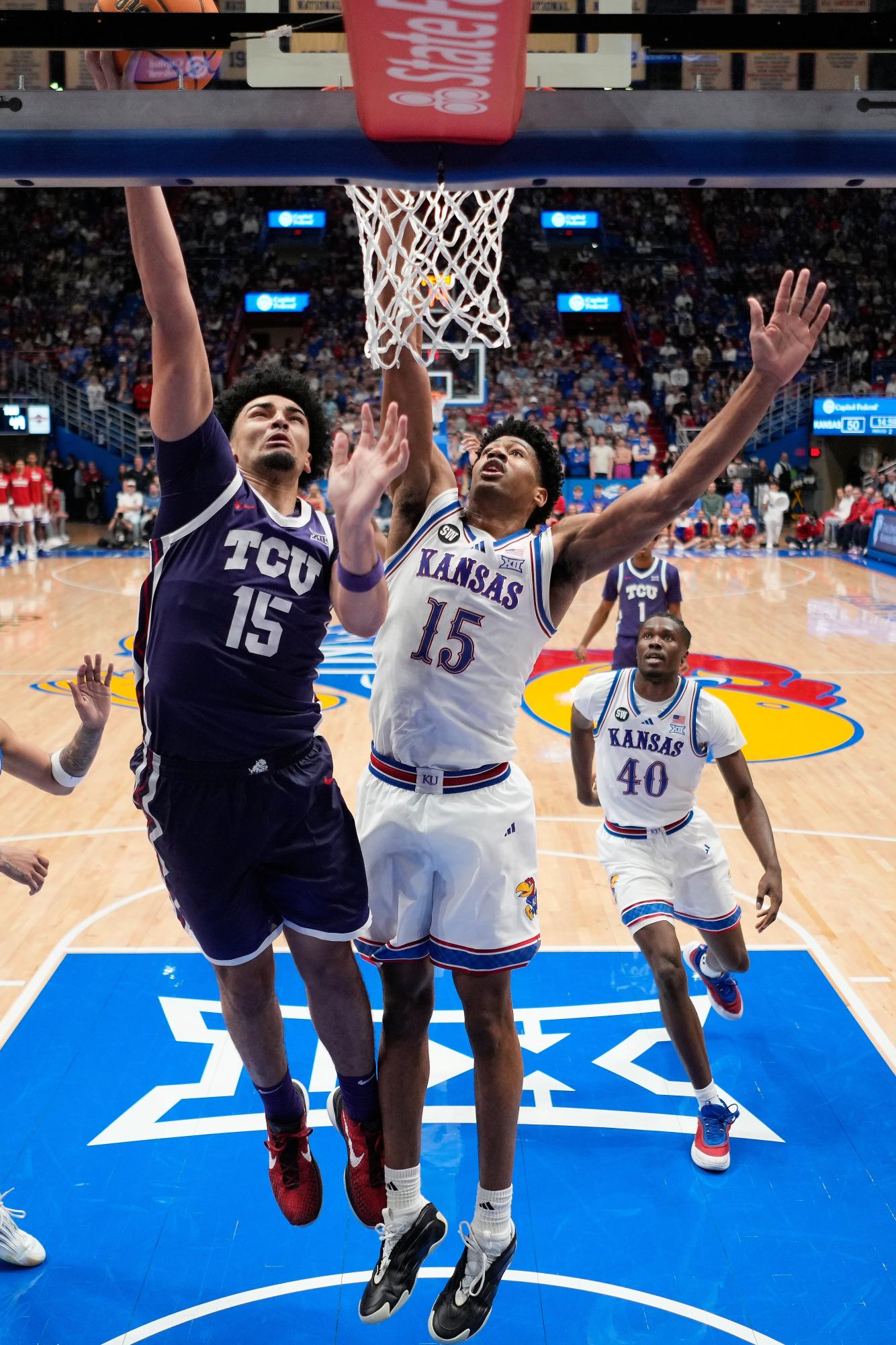 TCU men's basketball falls apart late in Lawrence