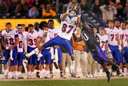 Boise State receiver Austin Pettis (87) catches a pass for a first down in front of TCU cornerback Rafael Priest (1) in the first quarter of the San Diego County Credit Union Poinsettia Bowl in San Diego, Calif. in December 2008. TCU defeated Boise State, 17-16. Photo by Ron Jenkins, Fort Worth Star-Telegram via MCT
