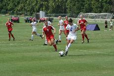 Freshman midfielder Katie Runyon dribbles past Ole Miss defender. Photo by Paige McArdle