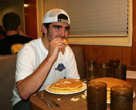 Fraternity members compete in pancake eating challenge