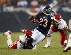 Chicago Bears Devin Hester gets tackled after catching a pass by Kansas City Chiefs Demorrio Williams during a NFL preseason football game at Soldiers Field in Chicago on Aug. 7. Photo courtesy of MCT