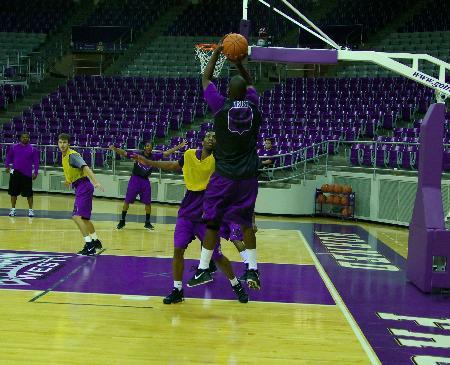 Basketball team begins practice with new coach